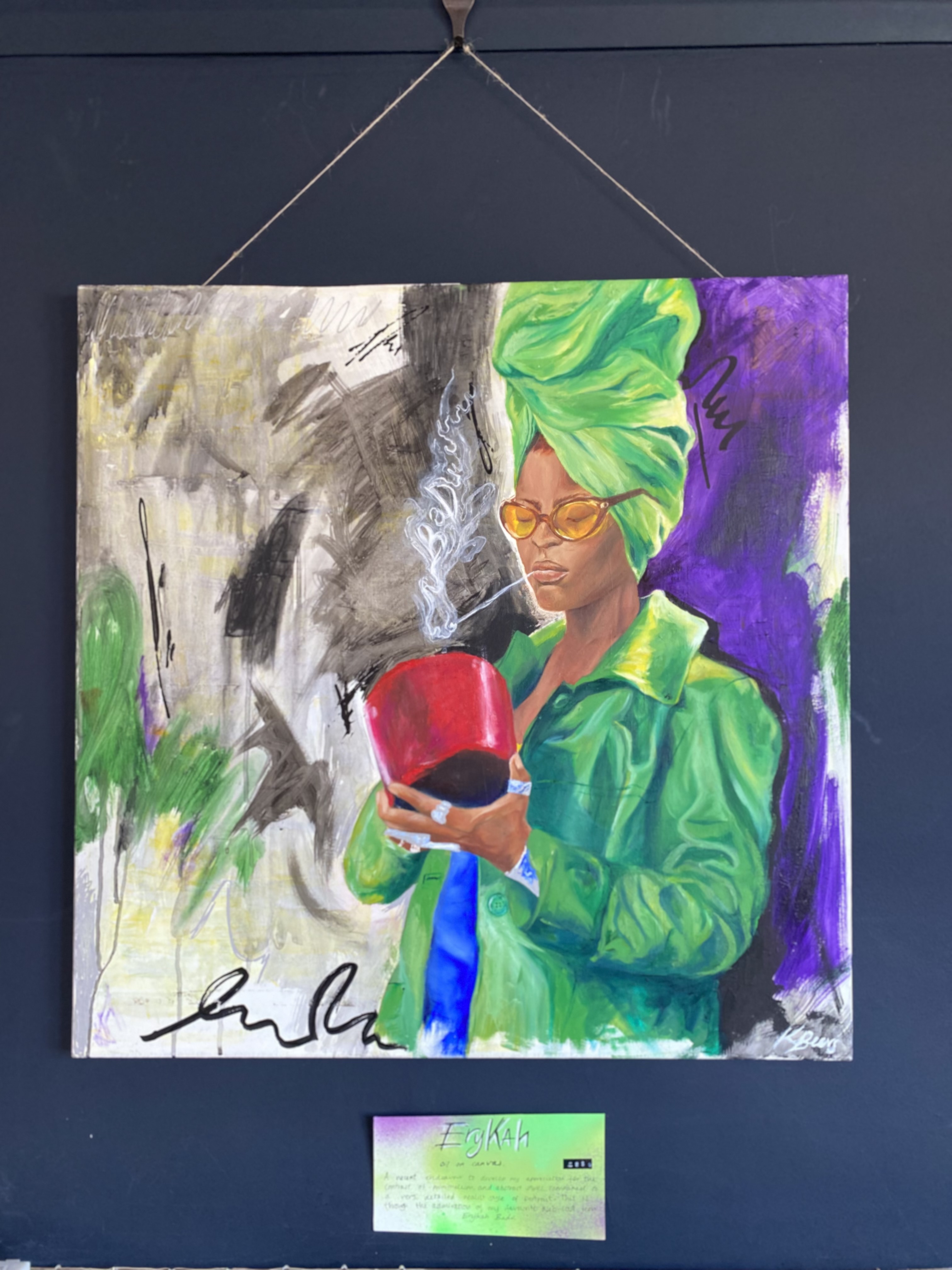 Portrait of woman with green headwrap